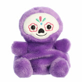 Deep purple palm pal plush with colorful sugar skull face, inspired by Dia de los Muertos.
