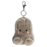 Gray tombstone clip-on plush with a cute face and small clip