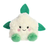 A fluffy white cauliflower plush resembling the vegetable, with green leaves and feet, an adorable smile, and pink blush