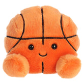 Hoops is a vibrant orange plush with black lines crisscrossing to mimic a basketballs segments, and her cheerful face!