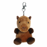Capybara plush Clip-On from Palm Pals, featuring a rich brown color and a sweet, gentle face