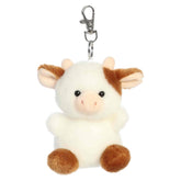 Caroline Brown Cow clip-on plush, white and brown spots with small horns and silver clip, from Palm Pals.