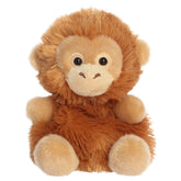 An orangutan plush toy from Aurora with fluffy orange fur, a sweet embroidered face, and a rounded body.