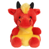 A Chinese dragon plush toy from Aurora with red fur, yellow accents, tiny horns, and an embroidered face.