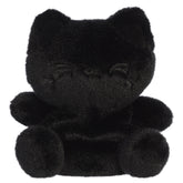 A black cat plush toy from Aurora with rounded paws and a facial expression embroidered entirely in black.