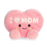 Pink heart plush with embroidered I Love Mom text, rounded Palm Pal shape, soft fabric body