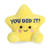 Yellow star plush with embroidered You Did It text, rounded Palm Pal shape, soft fabric body