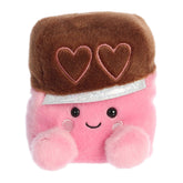 Chocolate plush from Palm Pals, nestled in a pink heart-adorned wrapper, exudes regality and sweetness for Valentines Day.