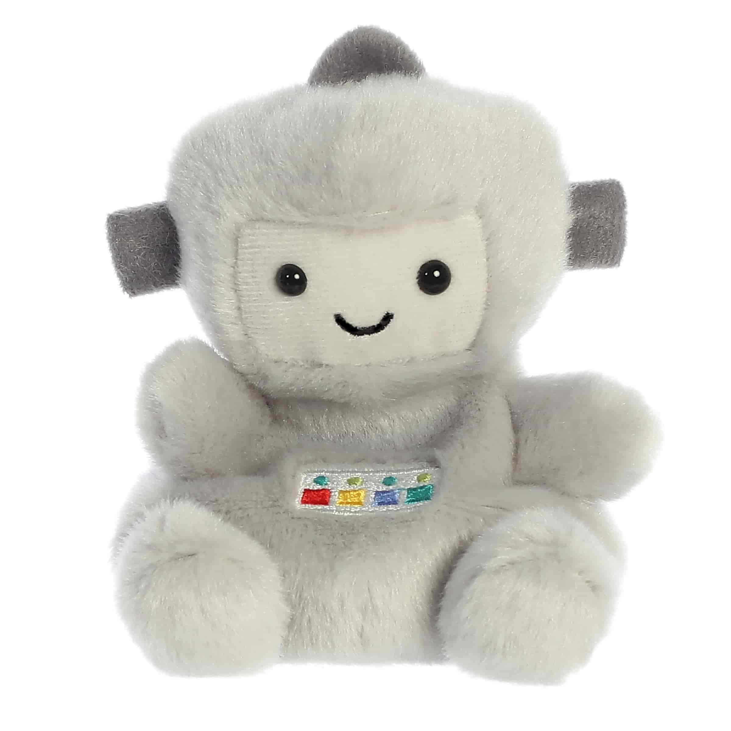Cuddly tiny robot plush toy with light gray soft fur, colorful embroidery pattern in the middle, and a smiling face design