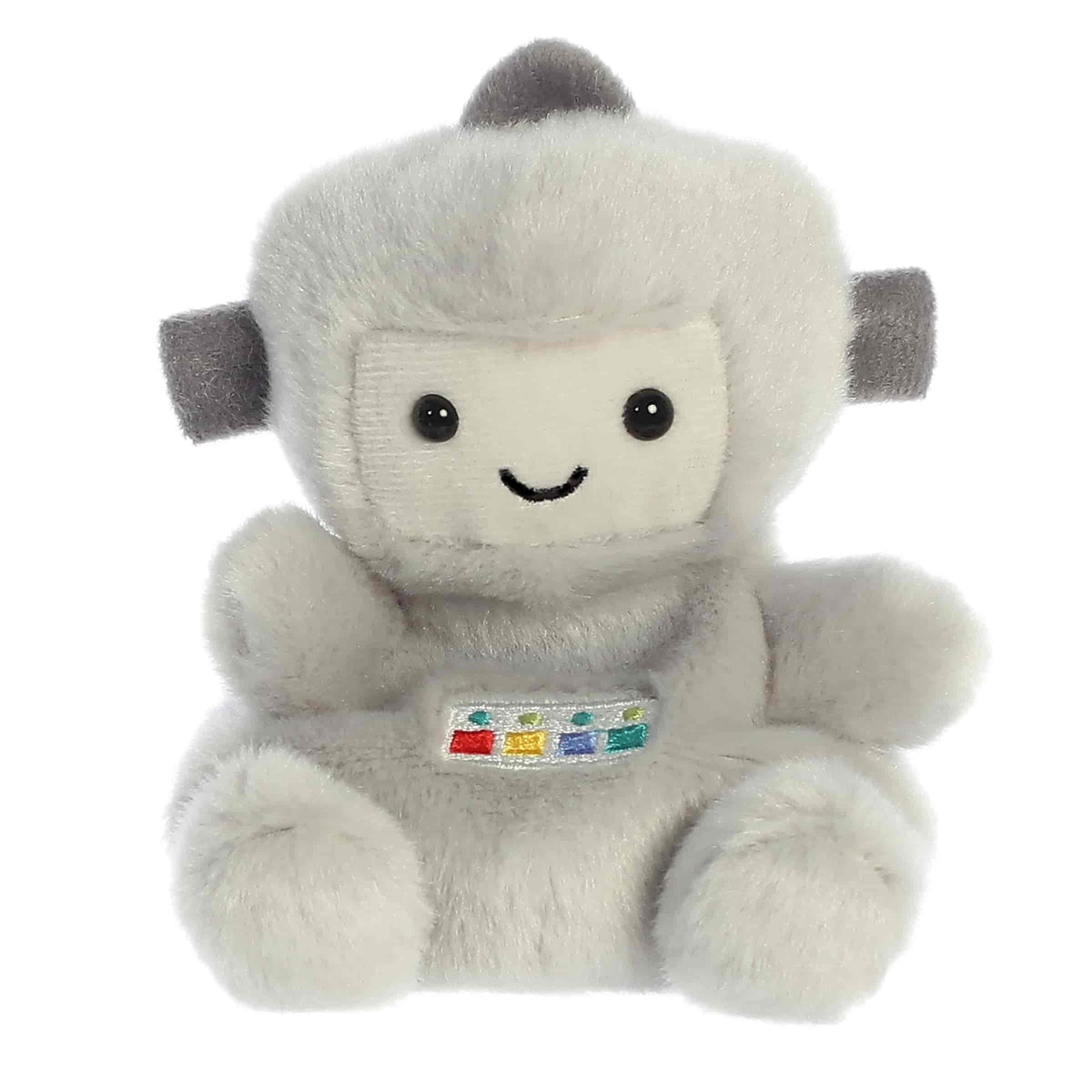 Cuddly tiny robot plush toy with light gray soft fur, colorful embroidery pattern in the middle, and a smiling face design