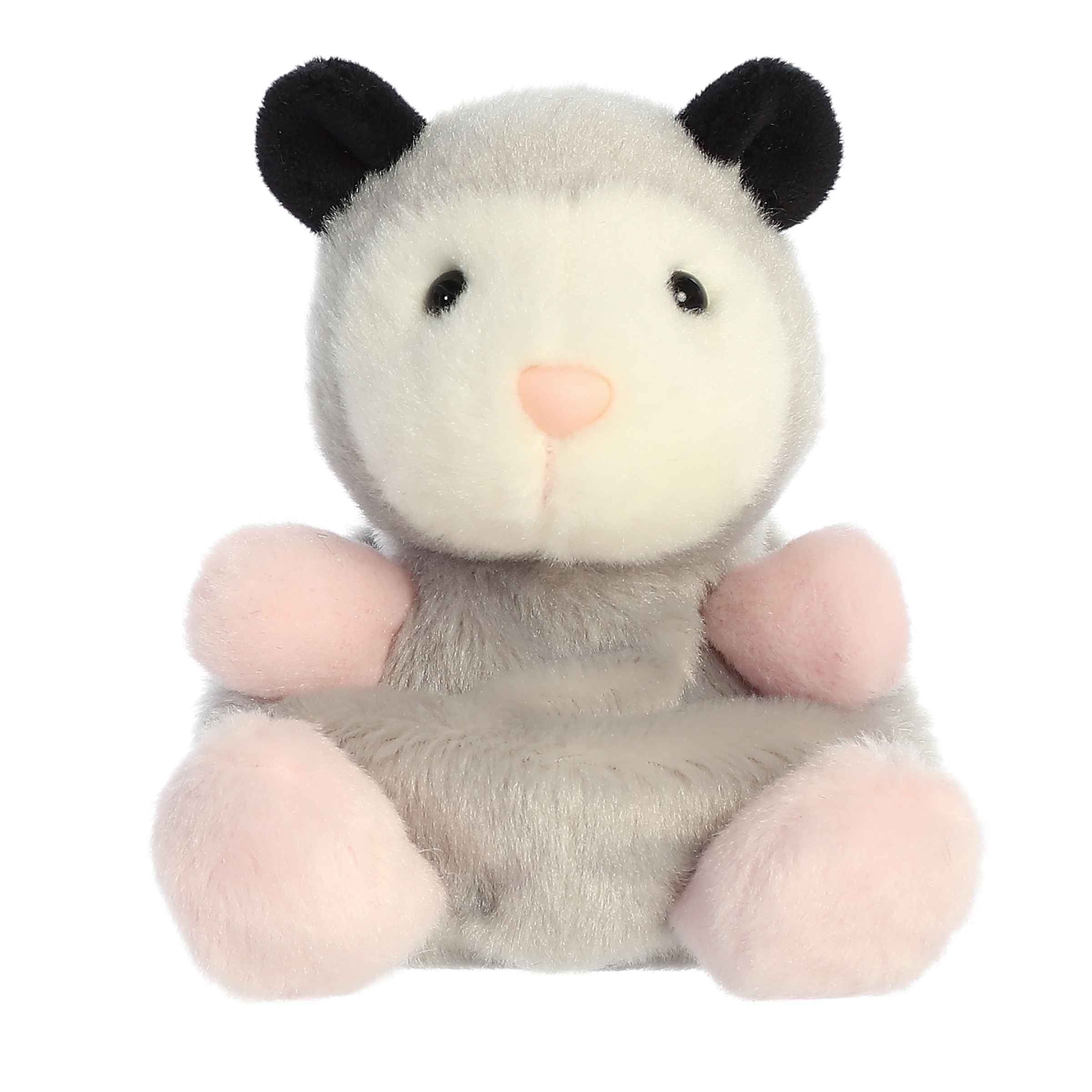 Plush toy of a gray and white opossum in the Palm Pals collection with black ears and pink paws.