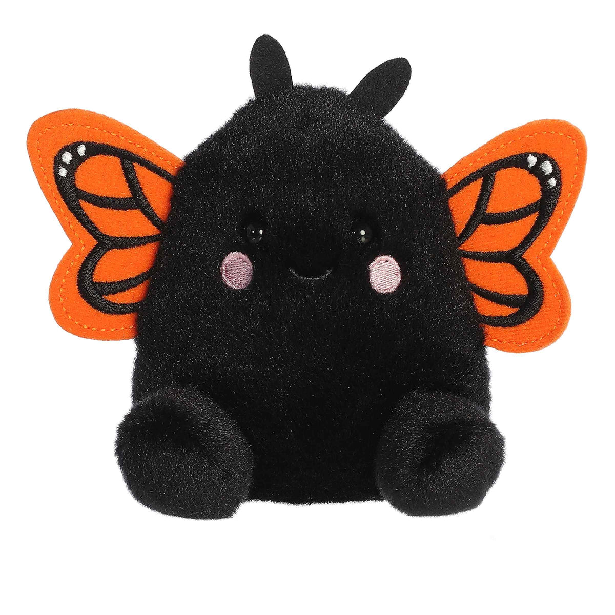 Plush toy of a black monarch butterfly in the Palm Pals collection with vibrant orange wings and pink eyes.