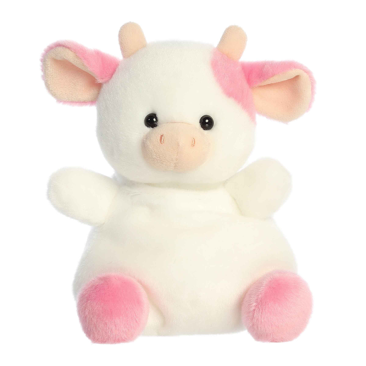 Larger plush toy of a white cow plush decorated with pink strawberry patches.