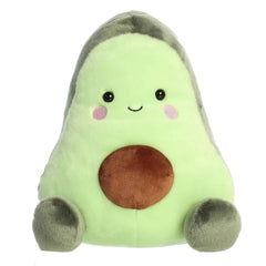 Plush toy of a green avocado in the Palm Pals collection, larger version, with a brown pit and happy face.