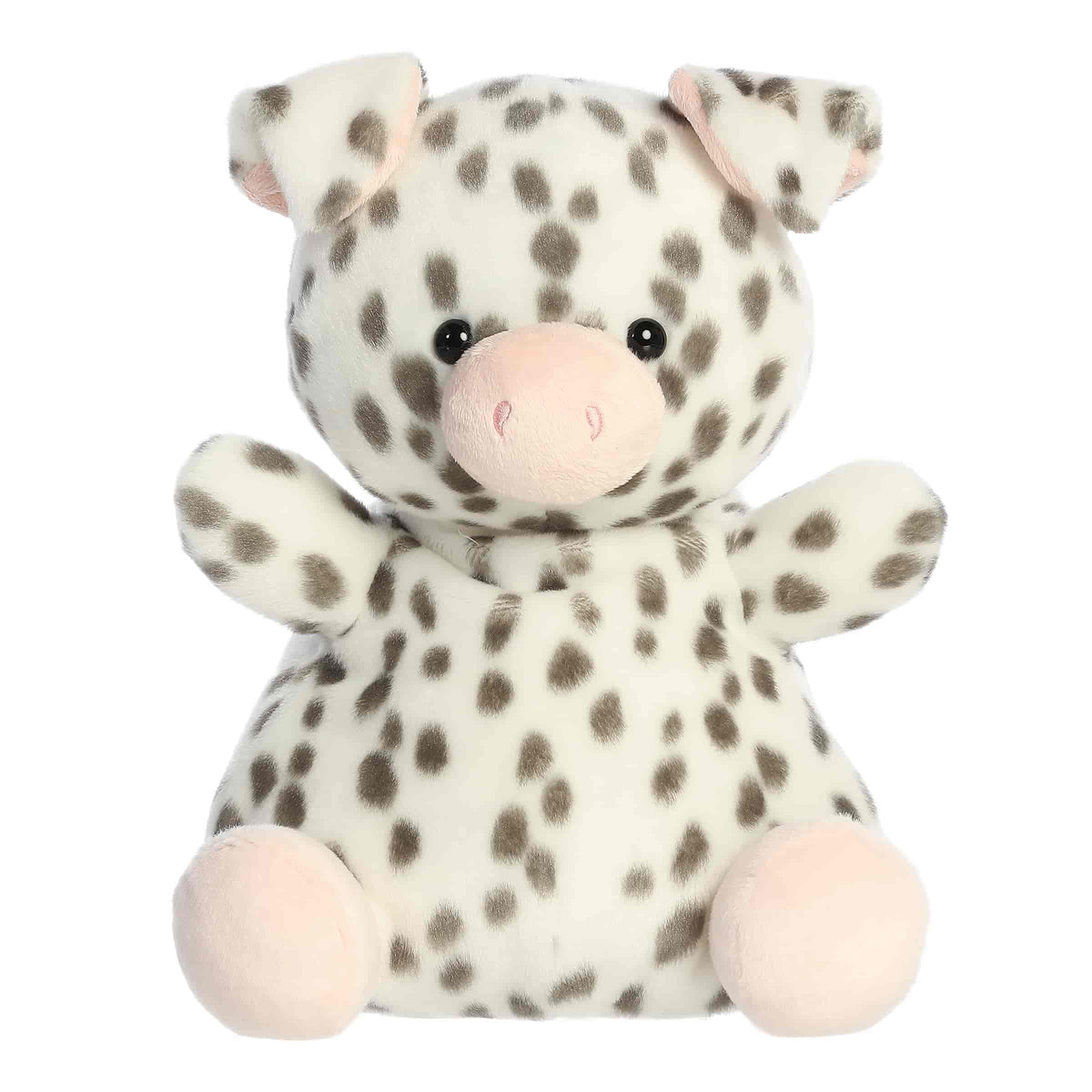 Larger plush toy of a white piglet in the Palm Pals collection, covered in black spots