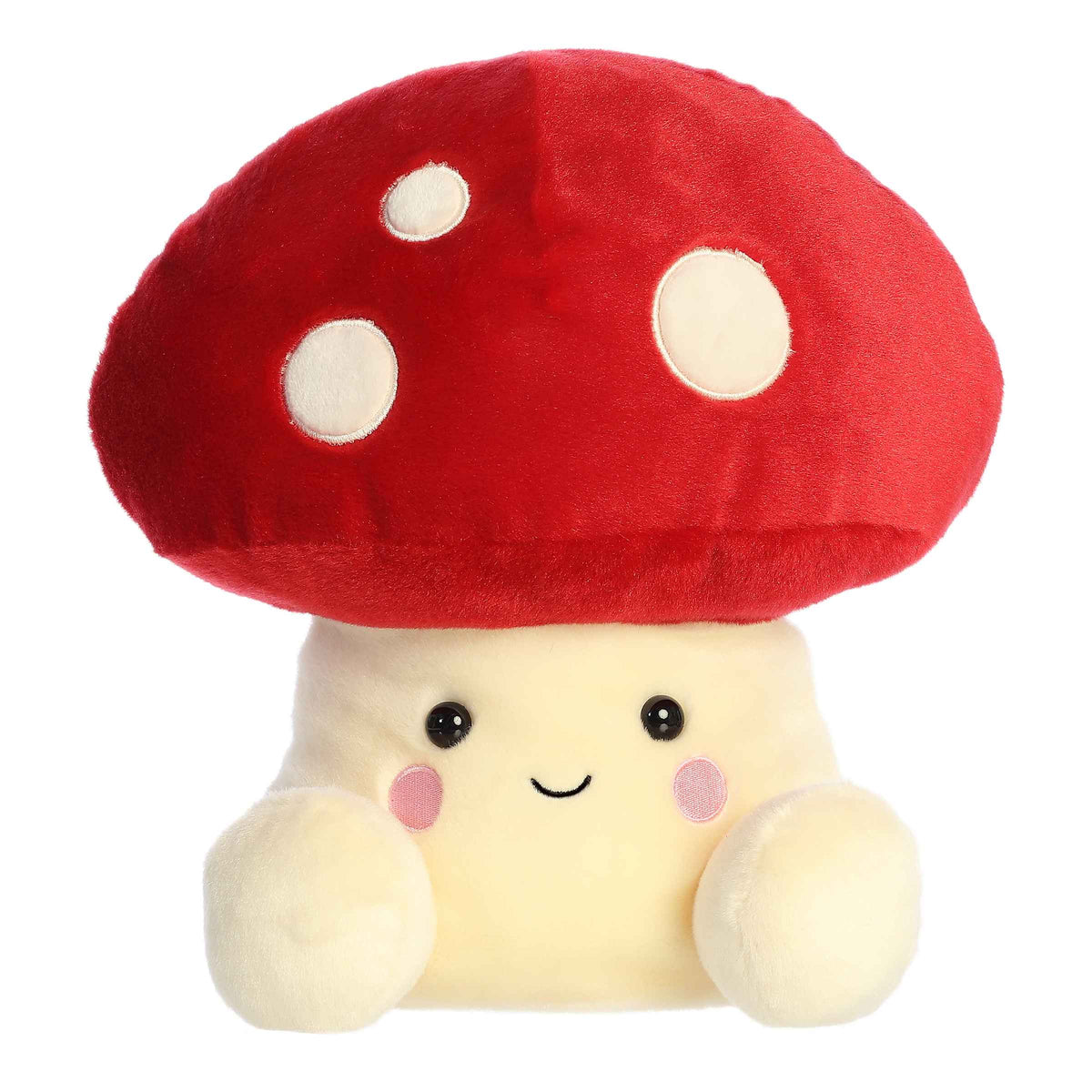 Larger toy of red Amanita mushroom plush in the Palm Pals collection, with a smiling face and white spots.