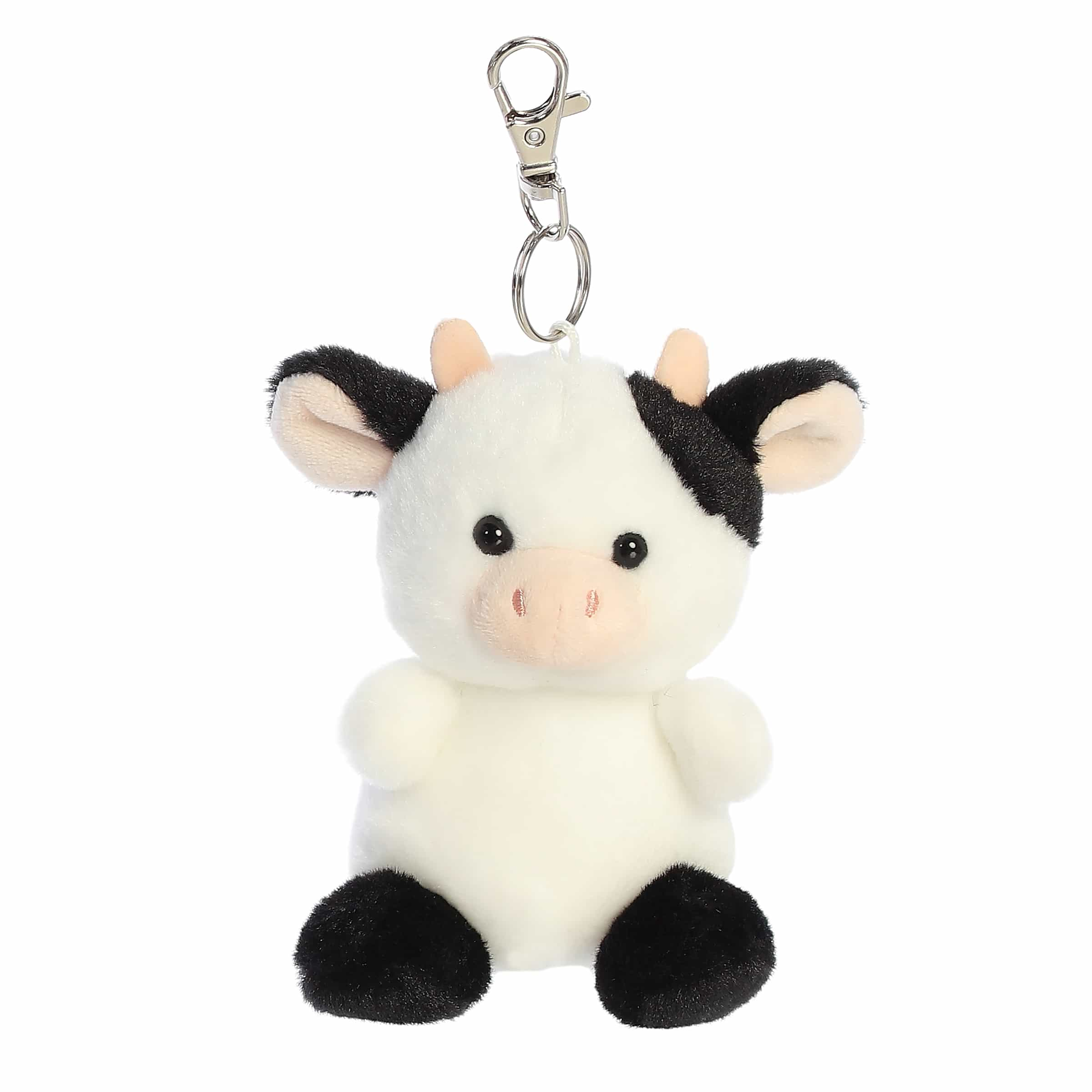 Sweetie Cow clip-on with soft, patterned fur and a gentle expression, embodying countryside charm.