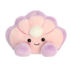 A small pink oyster plush with lavender edges and a pearl inside from Palm Pals by Aurora.
