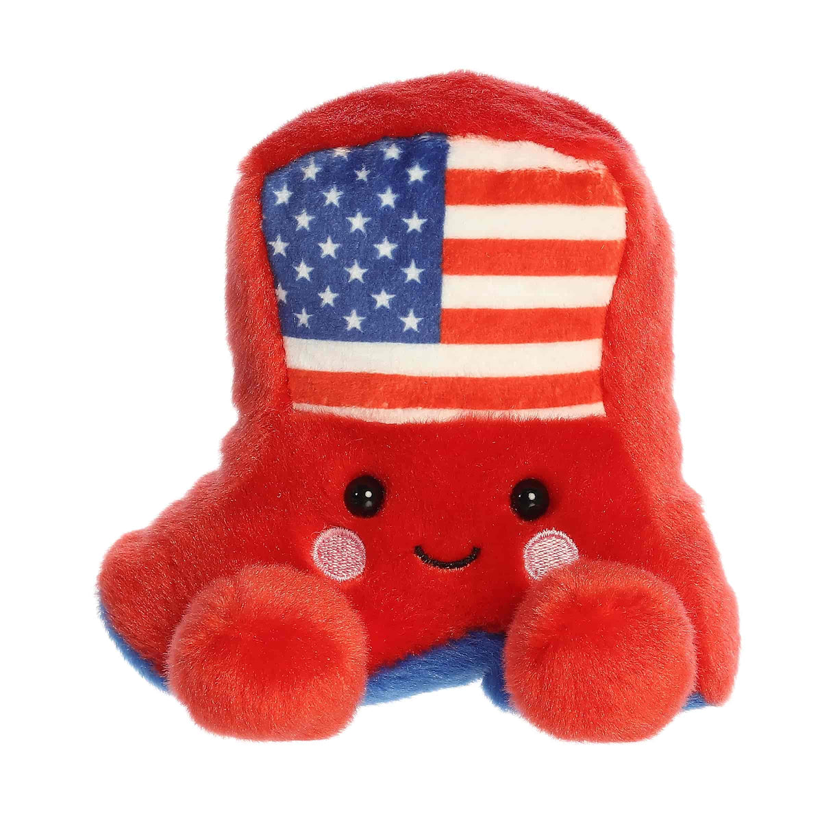 A small red cowboy boot plush with blue accents and a star-spangled flag design from Palm Pals by Aurora.