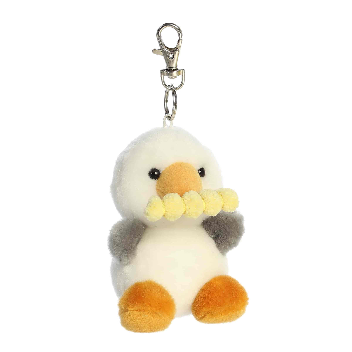 A small white and gray seagull plush clip-on holding a fry in its beak from Palm Pals by Aurora.