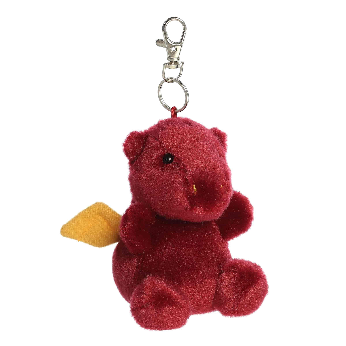 A small red dragon plush clip-on with golden wings and bright eyes from Palm Pals by Aurora.