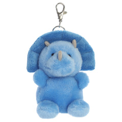 A triceratops plush toy from Aurora with blue fur, three facial horns, and a wide frill.
