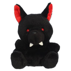 A hellhound plush toy from Aurora with black fur, pointed ears tipped in red, and subtle embroidered features.
