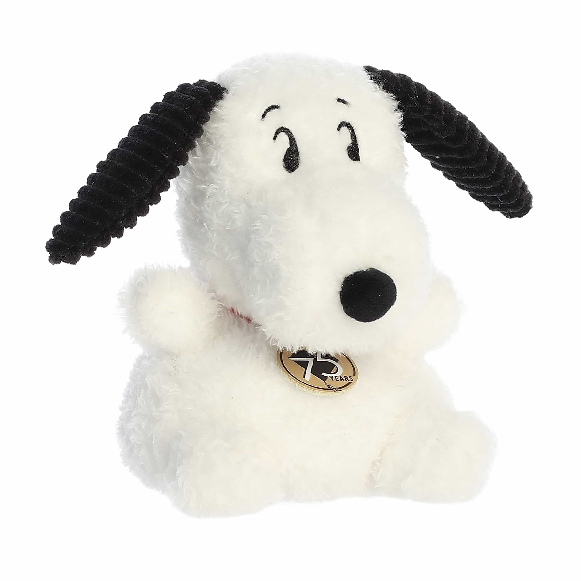 Snoopy plush with white body, black ears, red collar, and 75th anniversary hangtag in the Palm Pals collection.