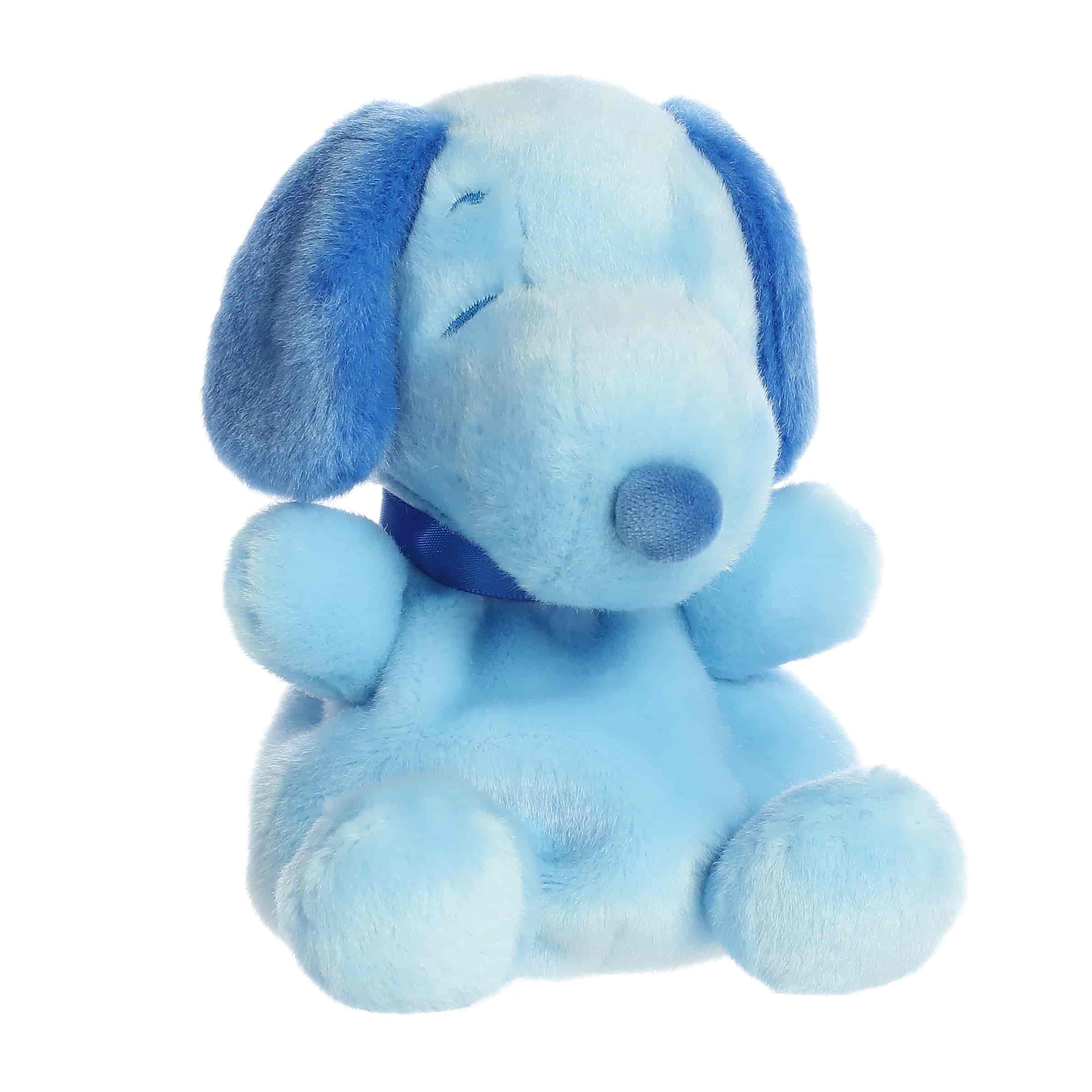 A blue Snoopy plush beagle with soft fabric and relaxed pose from Palm Pals Snoopy Color Collection.