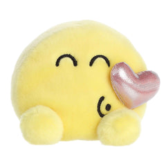 Plush toy from the SmileyWorld collection, featuring a bright yellow face with a kiss expression and a pink heart