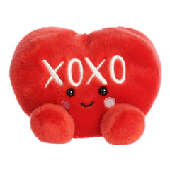 A red heart plush with “XOXO” embroidery and rosy cheeks from the Palm Pals Valentine’s Collection