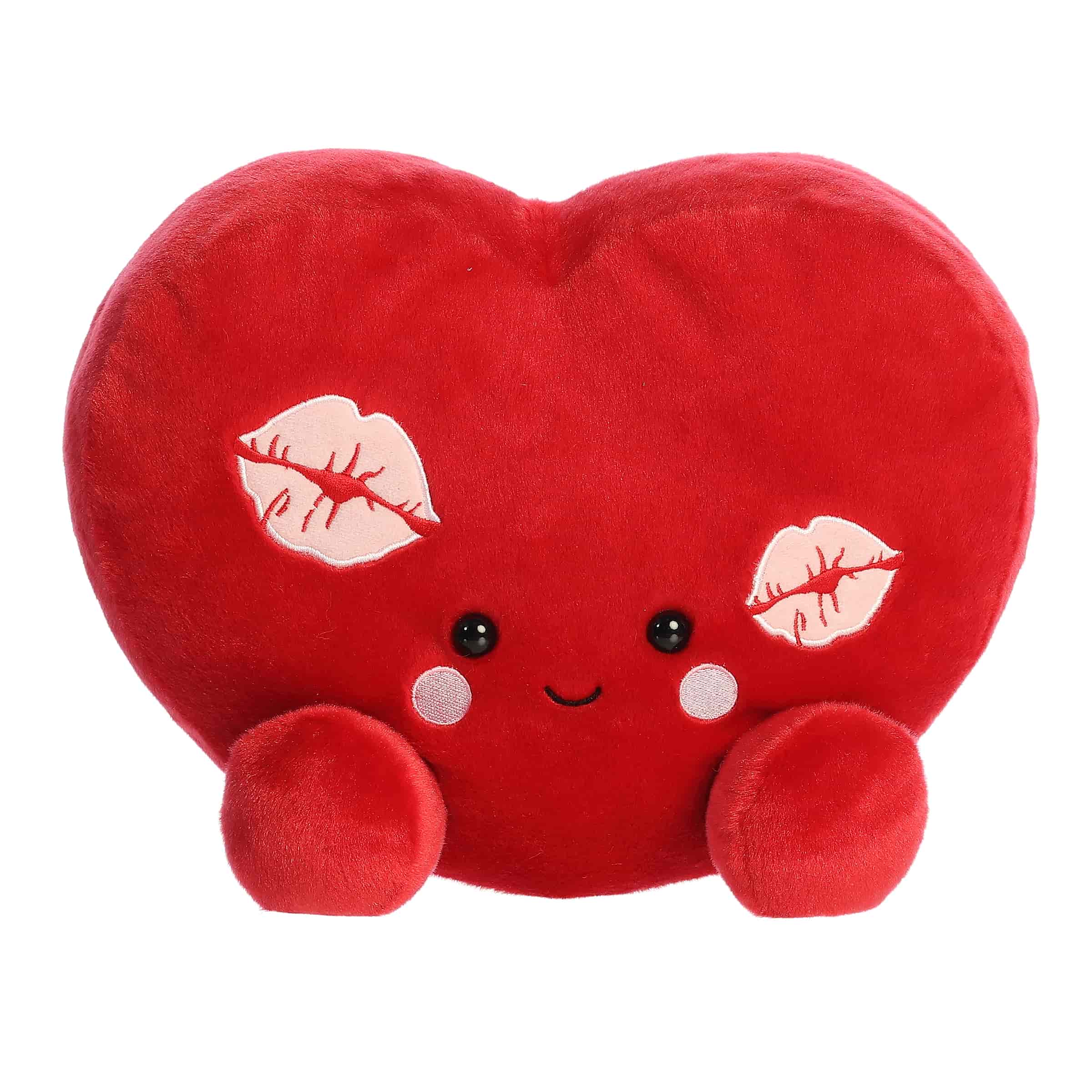 A large red heart-shaped plush with rosy cheeks and kiss marks from the Party-Sized Palm Pals Valentine’s Collection