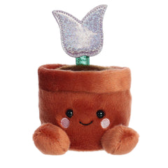 Plush toy of a smiling tulip in a pot, with a sparkling blue flower and cute face, fits in the palm of your hand