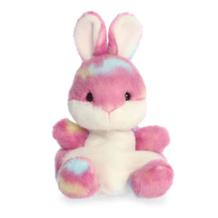 Pink bunny plush with candy-style accents, rounded Palm Pal shape, soft fabric body, and cheerful face