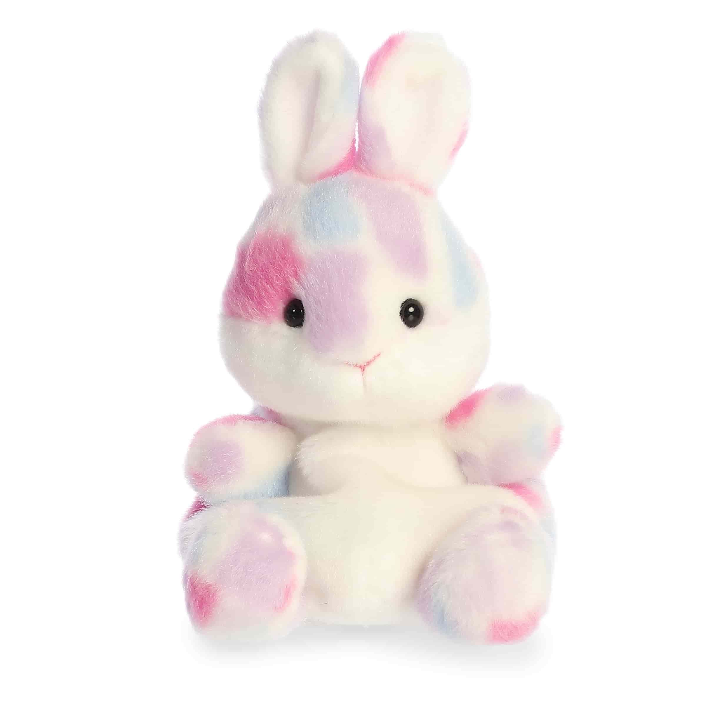 Pastel mosaic bunny plush with rounded Palm Pal shape, soft fabric body, and cheerful expression