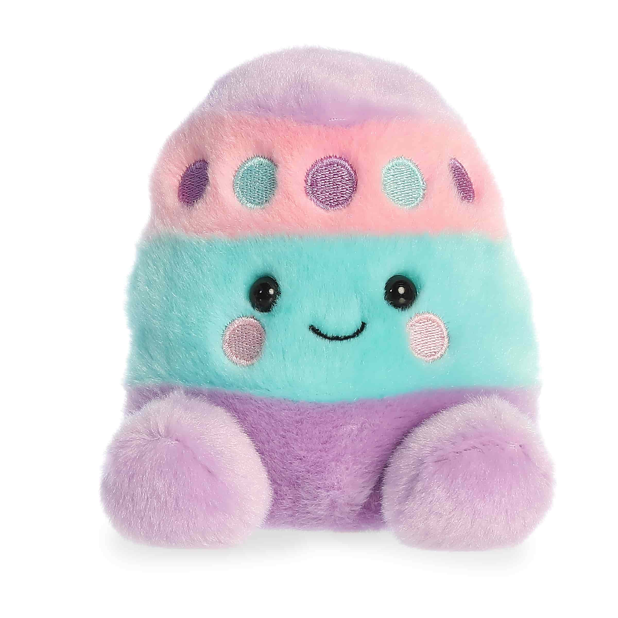 Pastel Easter egg plush with rounded Palm Pal shape, candy-inspired colors, and smiling face