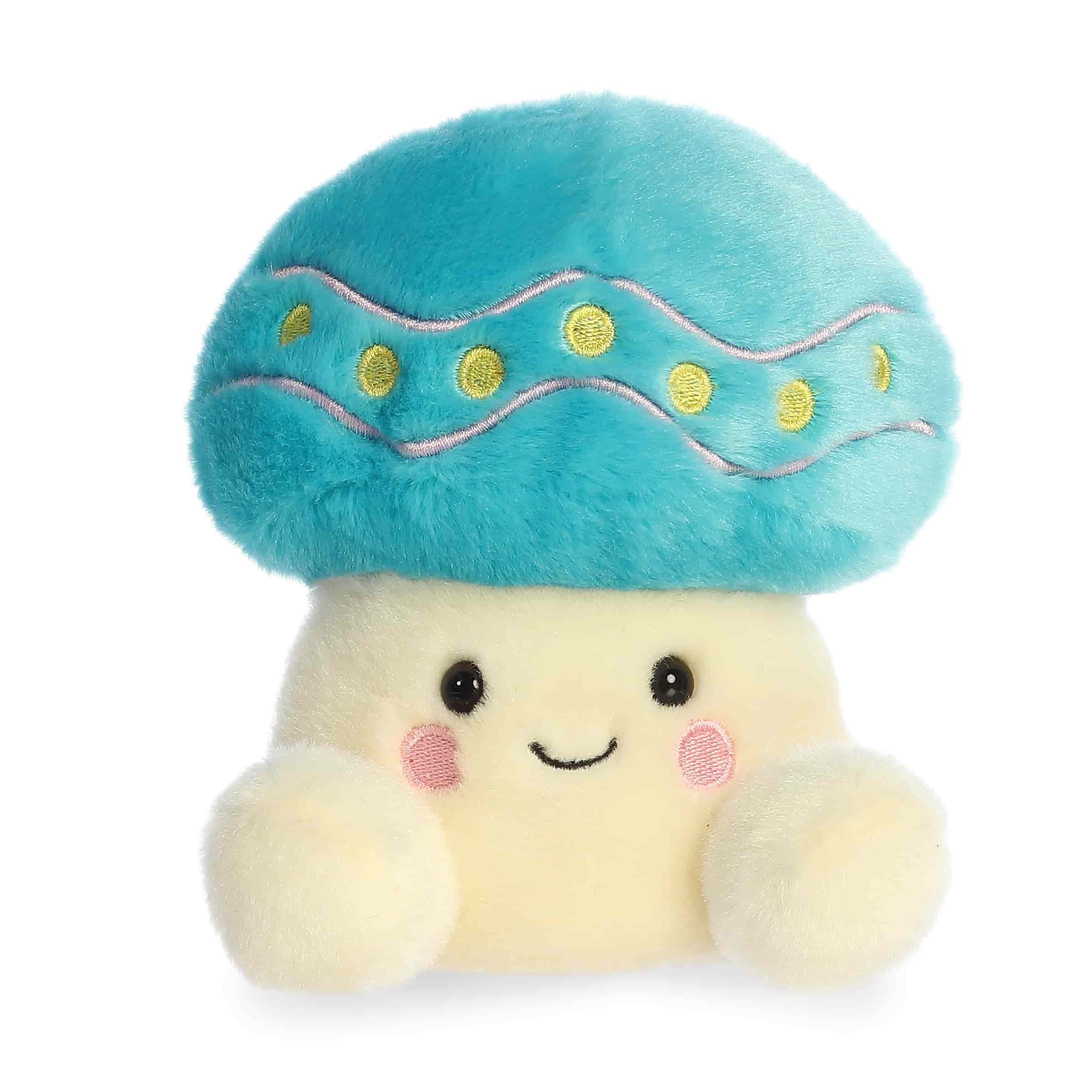 Pastel mushroom plush with rounded Palm Pal shape, soft fabric body, and cheerful smiling face