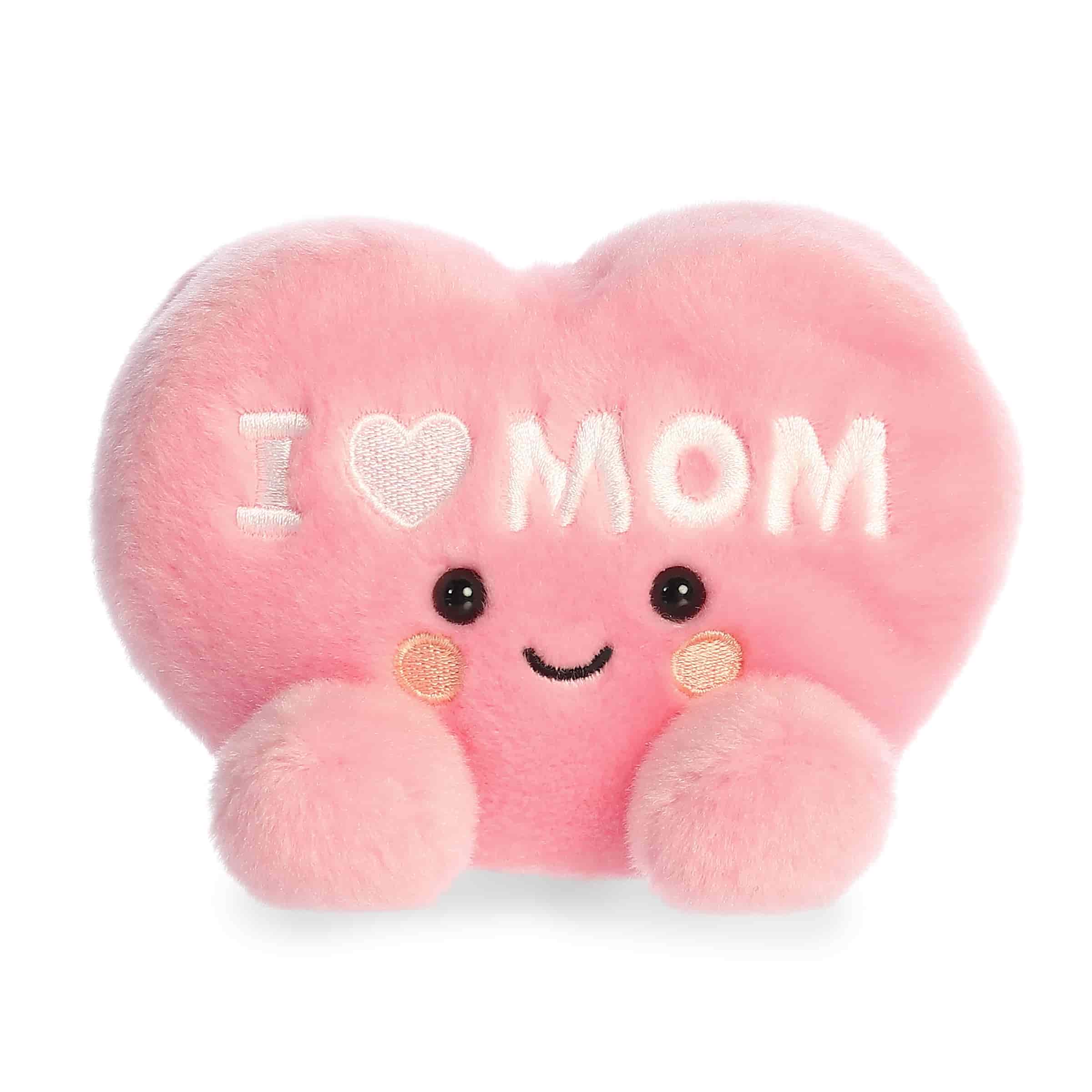 Pink heart plush with embroidered I Love Mom text, rounded Palm Pal shape, soft fabric body