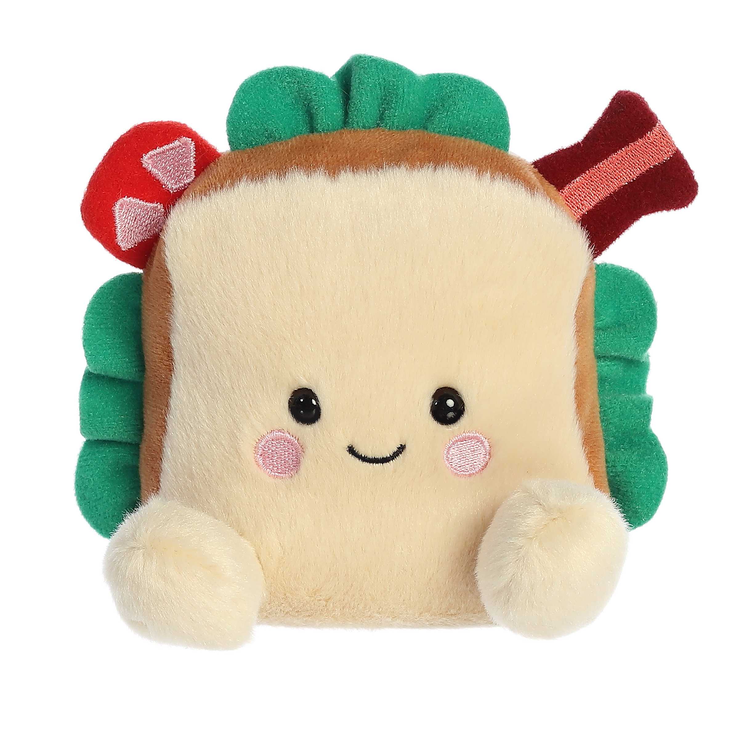 A yum-looking plush resembling a BLT sandwich on tan bread with green lettuce, red tomato, and crispy brown bacon peeking out