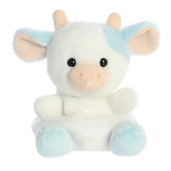 An adorable white cow plush that has light blue spots throughout the body, two cute little plush horns, and a soft pink snout