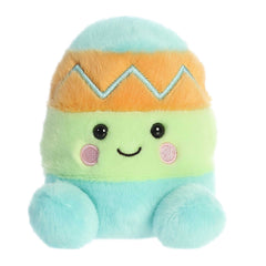 Ziggy Egg Palm Pal plush by Aurora, pastel blue with soft orange and green zigzag pattern, rosy cheeks, and black eyes
